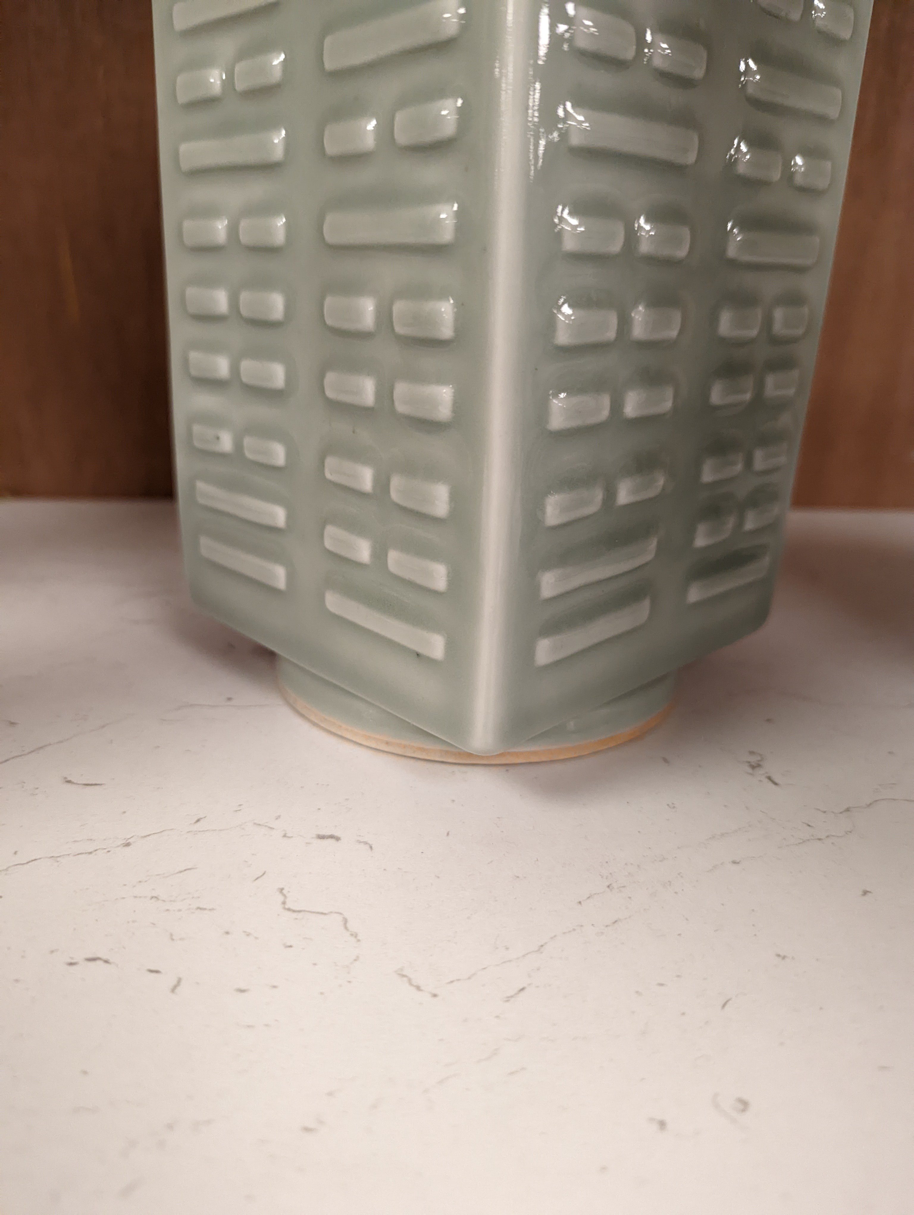 A Chinese celadon glazed eight trigrams cong shaped vase, Guangxu mark and possibly of the period. Provenance - owner bought in auction 20 years ago. 25cm tall